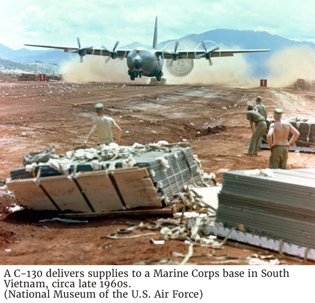 A C-130 delivers supplies to a Marine Corps base in South Vietnam, circa late 1960s. (National Museum of the U.S. Air Force)